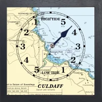 tide clock in black wooden frame for Culdaff co Donegal